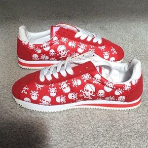 Women’s red skull sneakers